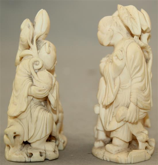 Two Chinese ivory groups, late 19th / early 20th century, 7.8cm and 8cm